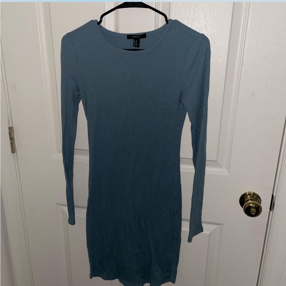 Blue long sleeved bodycon dress